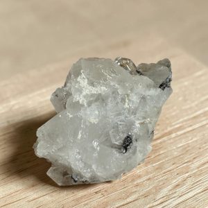 Alternative view of Brookiet in kwarts cluster - 9